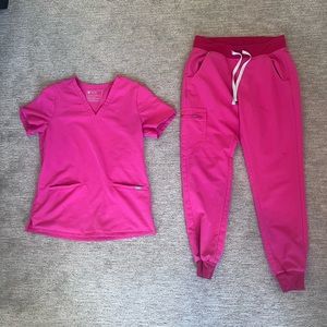 Hot pink jogger style scrub pant with 3 pocket scrub top